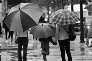 shared parenting in divorce parents under umbrellas