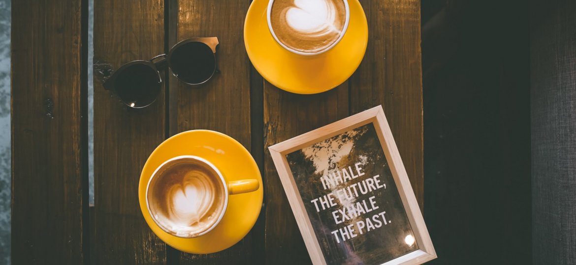 inhale the future sign with coffee