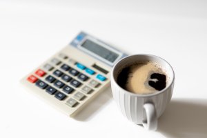 Calculator and coffee