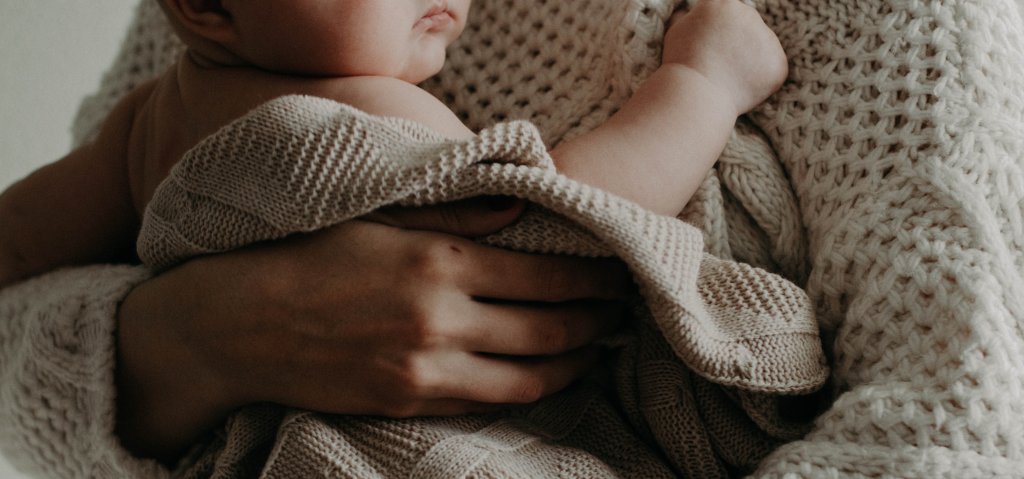 Mother Holding Child