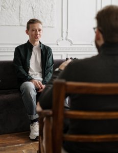 Child speaking with counsellor