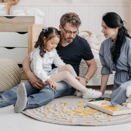 parents talking with small child