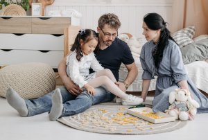 parents talking with small child