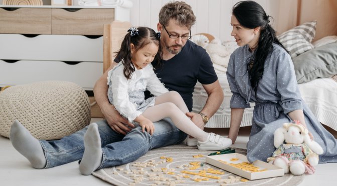 parents talking with small child