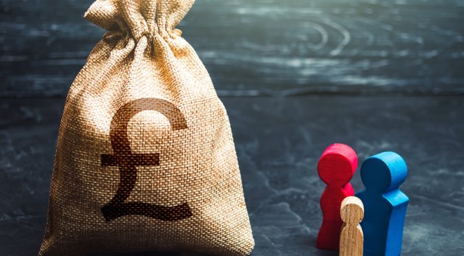 Family figurines and british pound sterling money bag.