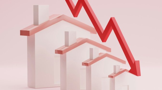 houses in a row with downward arrow indicating drop in value