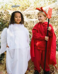 Little girl dressed as and angel and littl eboy dressed as a devil