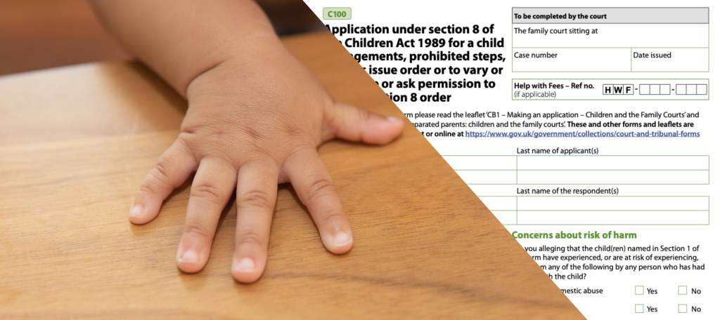 Child’s hand resting on a desk and a c100 form; prohibited steps order