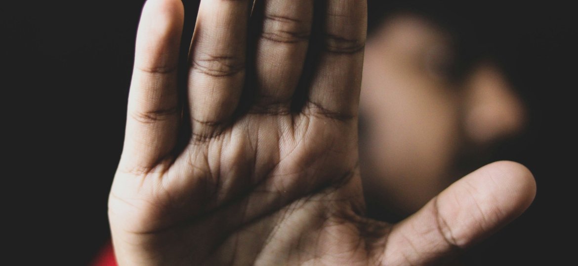 hand up in front of face - safeguarding concerns