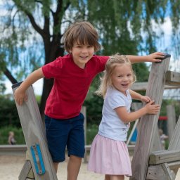 a-photo-of-two-children-happily-playing